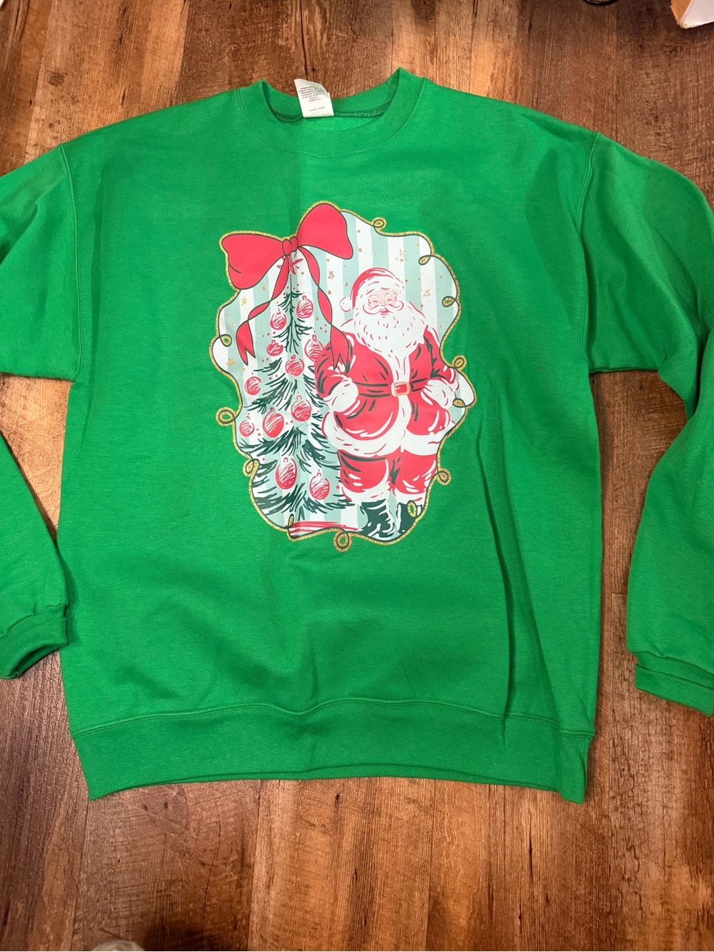 Woman’s Green Santa Graphic Sweatshirt